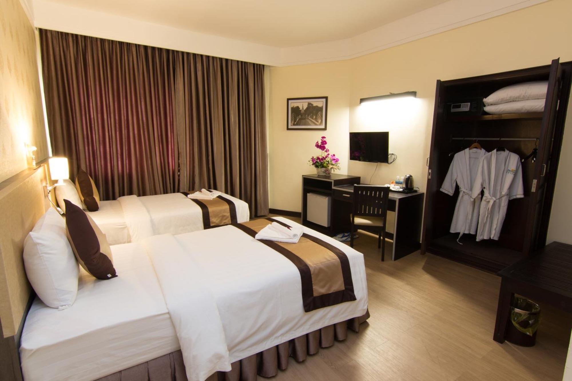 Paradise Hotel Phnom Penh Quarto foto