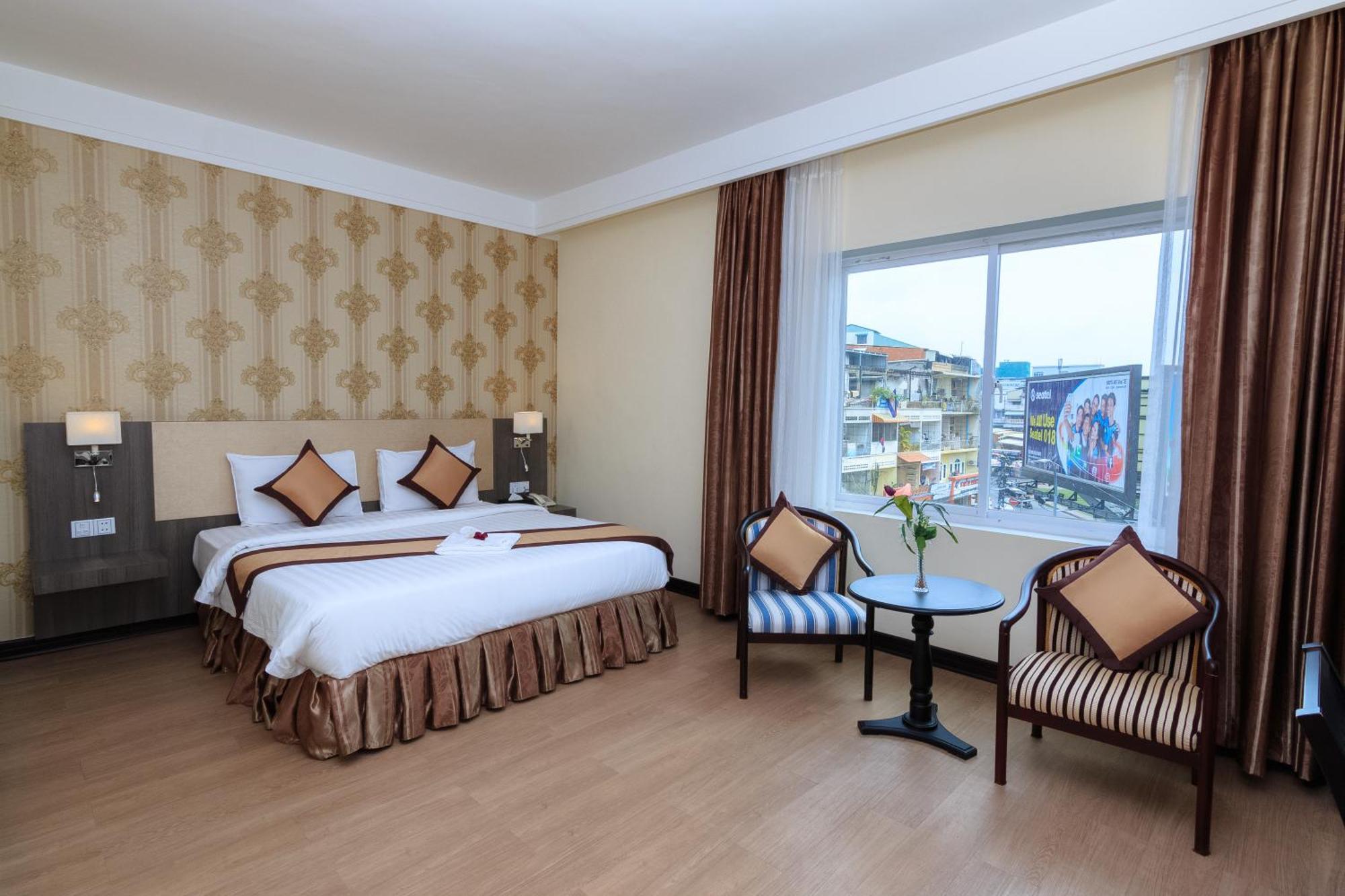 Paradise Hotel Phnom Penh Quarto foto
