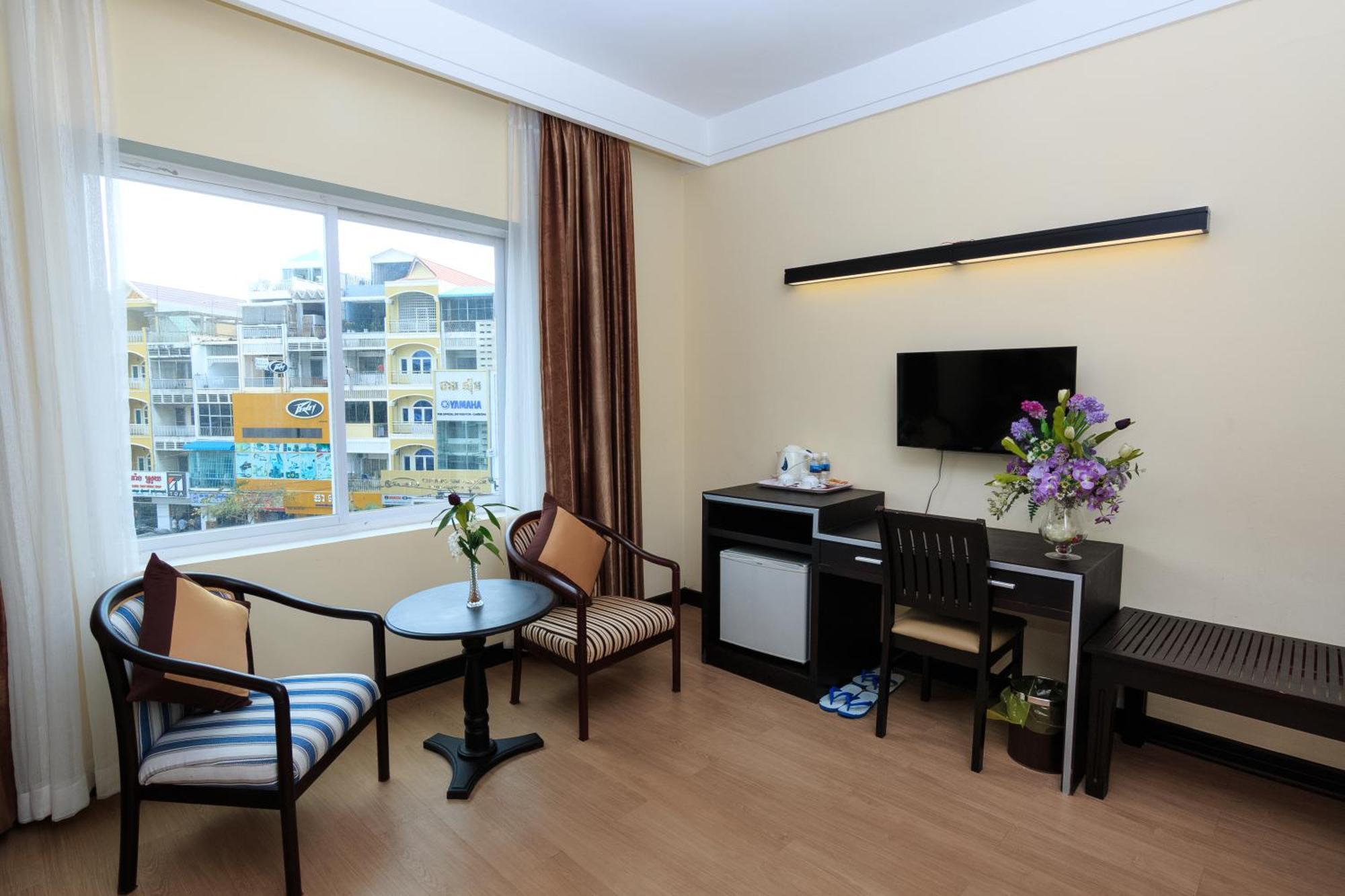 Paradise Hotel Phnom Penh Quarto foto